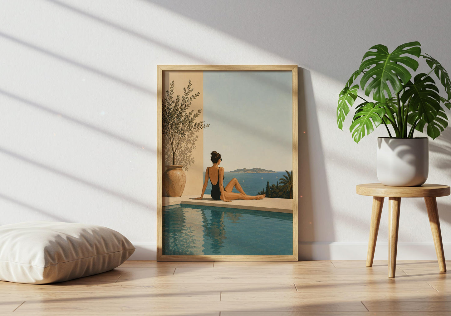 Mediterranean coastal artwork with a seated woman, olive tree in a terracotta pot and tranquil blue water.
