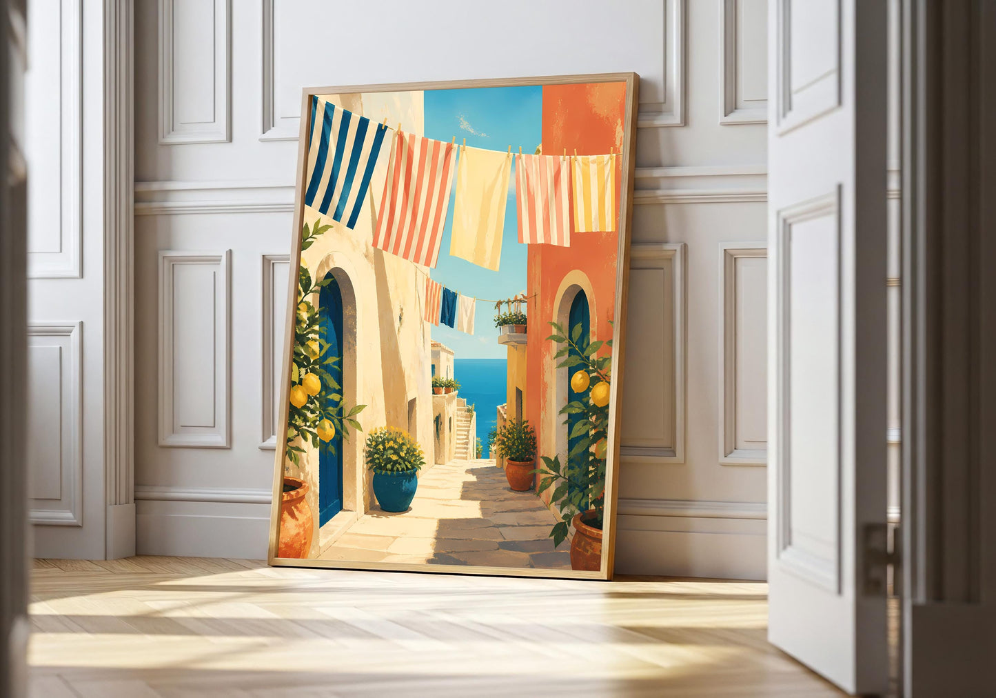 Mediterranean street wall art print with colorful laundry line and lemon trees, framed on white living room wall