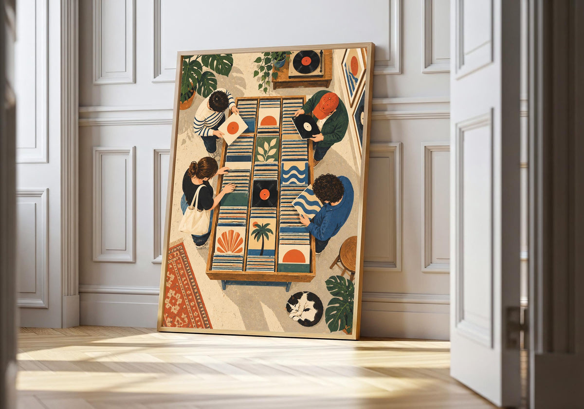 Record Shop Browsers record shop print in a light wood frame, featuring two people browsing vinyl among turntables, sleeves, plants and patterned rugs.