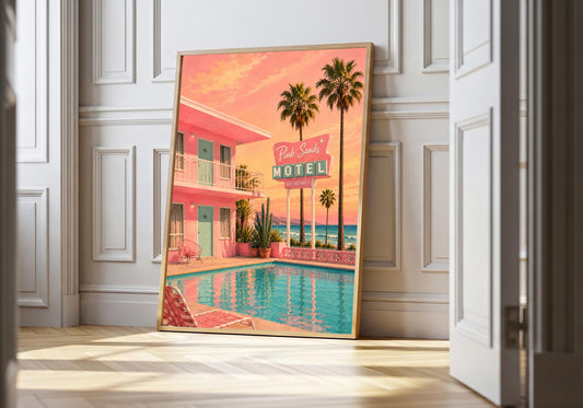 Pink Motel by the Sea pink motel print, a bubblegum-pink roadside motel with palms, pool and ocean air, leaning in a light natural-wood frame in a bright panelled interior; pink, aqua, sunset peach and sky blue portrait wall art.