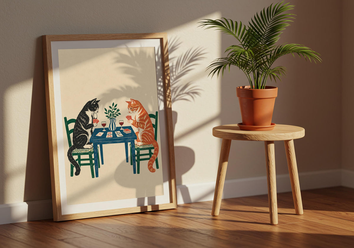 This interior composition pairs the inky black, ginger orange, bottle green and deep blue artwork with a contrasting frame and lived-in styling.