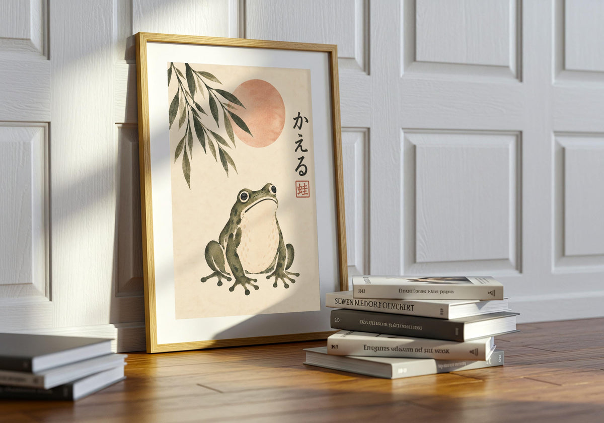 A close view shows the frog print near stacked books, including bamboo leaves and Japanese-style marks.