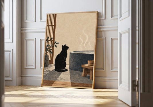 Black cat bathroom print showing a seated cat beside a steaming stone bath, staged in a light wood frame.