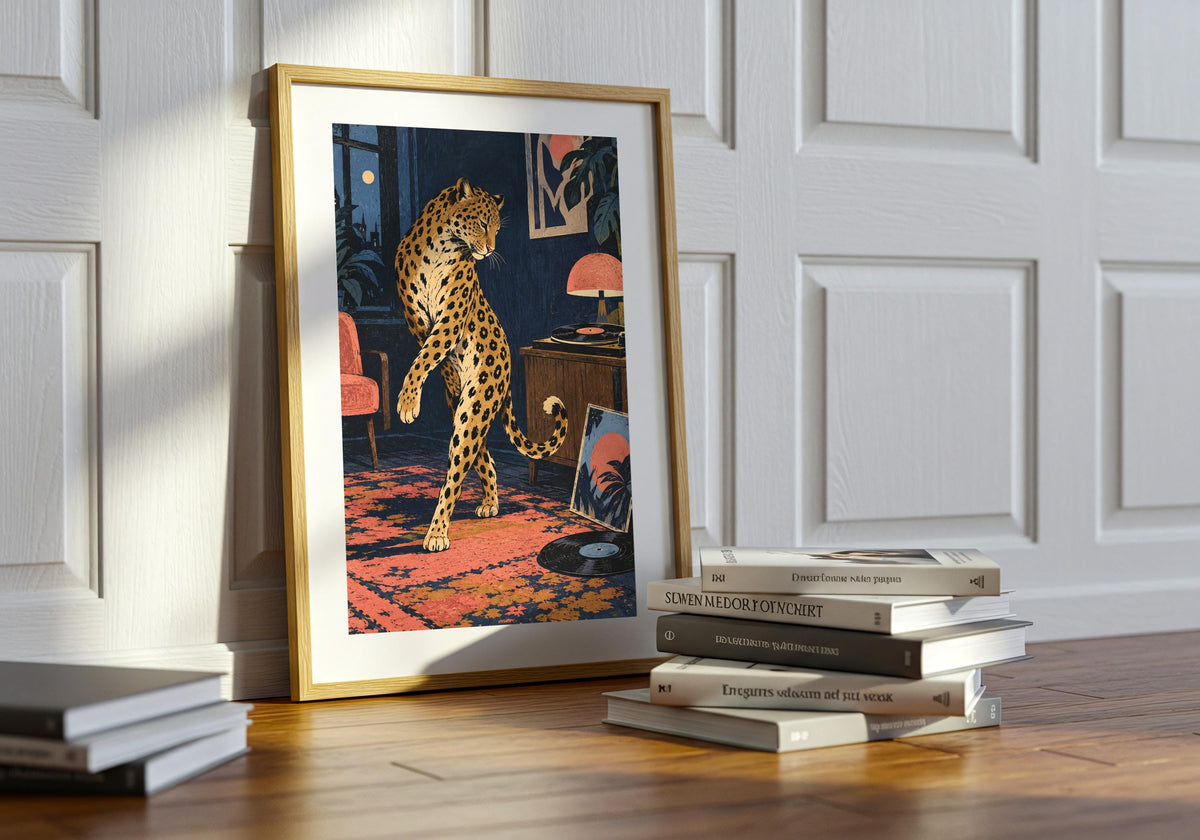 Here, the print of the theatrical leopard scene sits on a table beside stacked books.