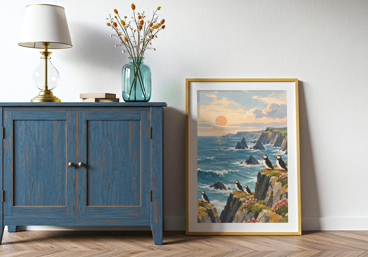 Shown on the floor beside a blue cabinet, the illustration features the layered coastal rocks.