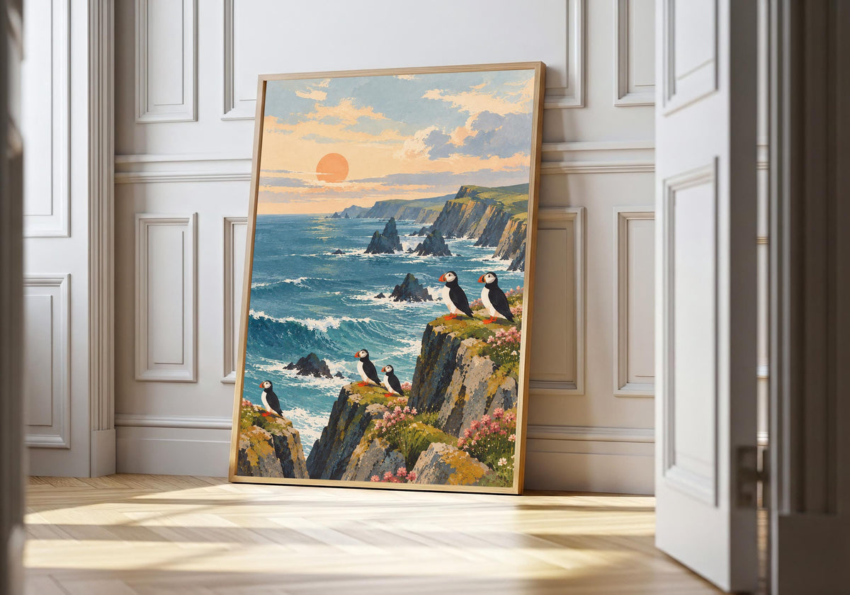 A framed view of puffins perched on coastal cliffs is displayed at a white panelled doorway.