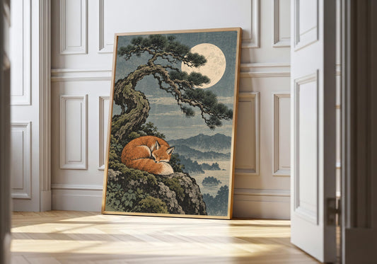 A framed view of the orange fox on a mossy rock is displayed at a white doorway.
