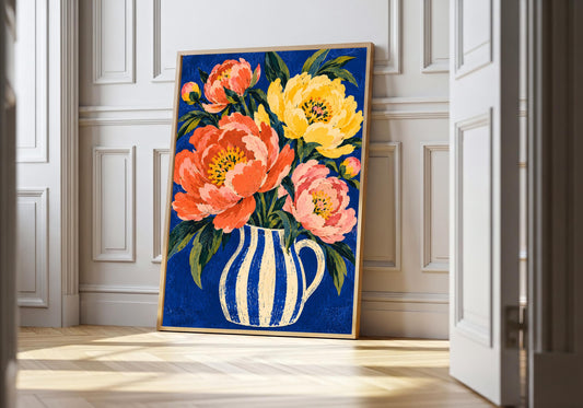 A framed view of peonies in a striped blue jug is displayed at a white panelled doorway.