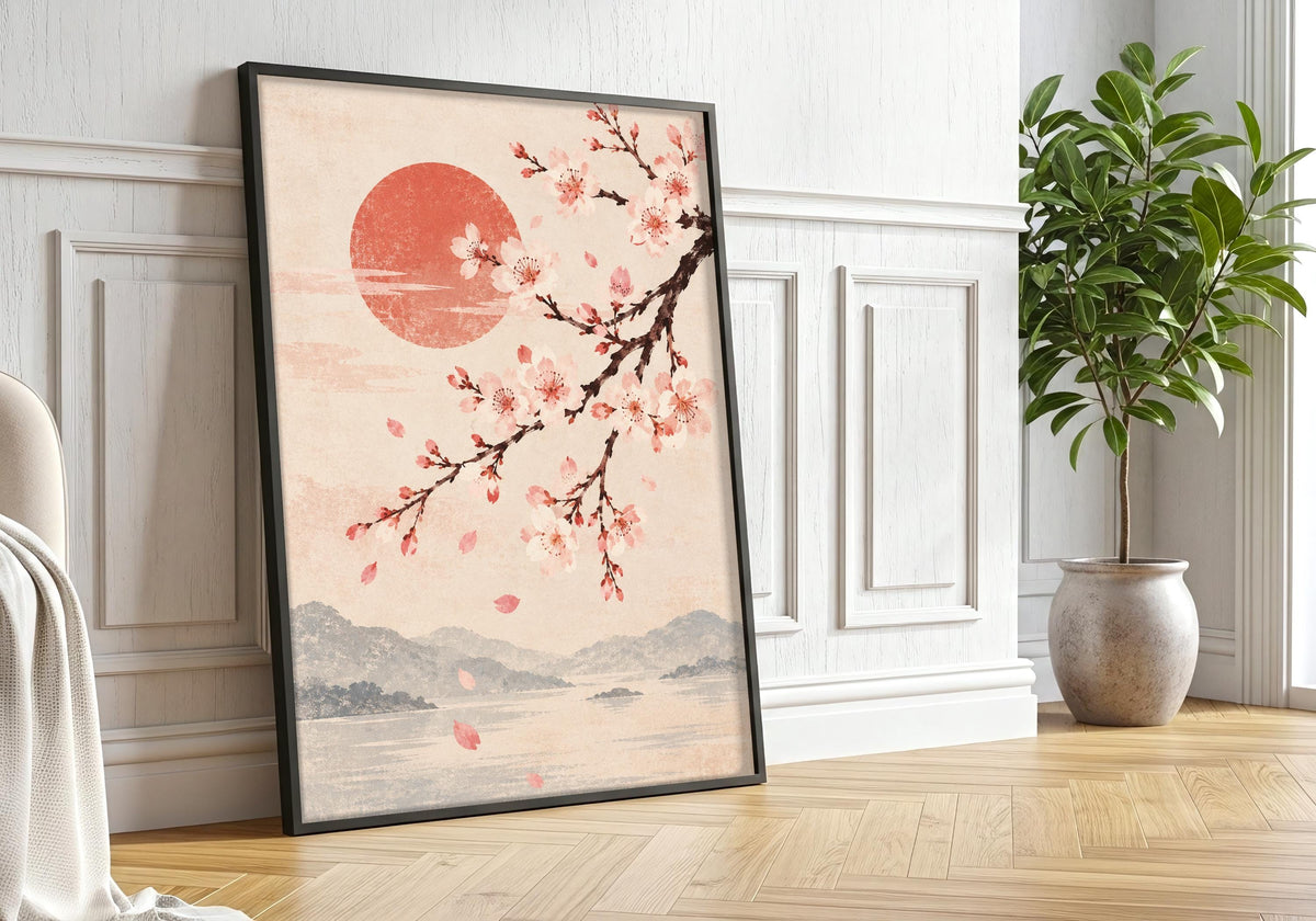 A closer black frame greenery view centres the framed japanese wall art featuring cherry blossom branch over misty mountains.