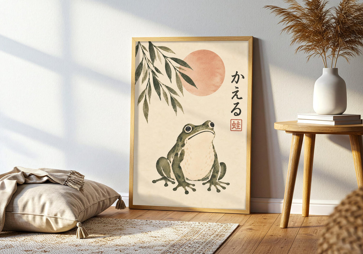 Muted coral and olive tones appear in a leaning frog illustration beside a cushion and wooden table.