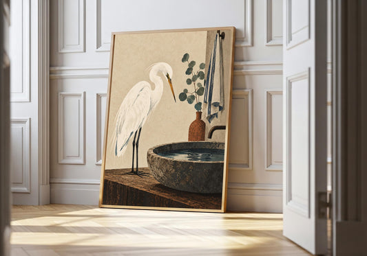 White egret beside a stone washbasin in the hero mock-up, with a striped towel and rust vase