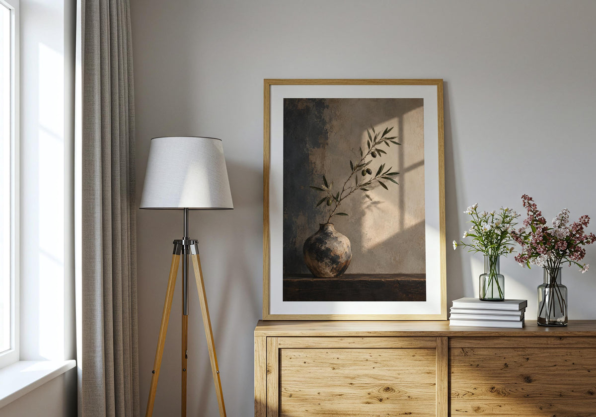 Console-room display shows the softly lit still life above a low cabinet.