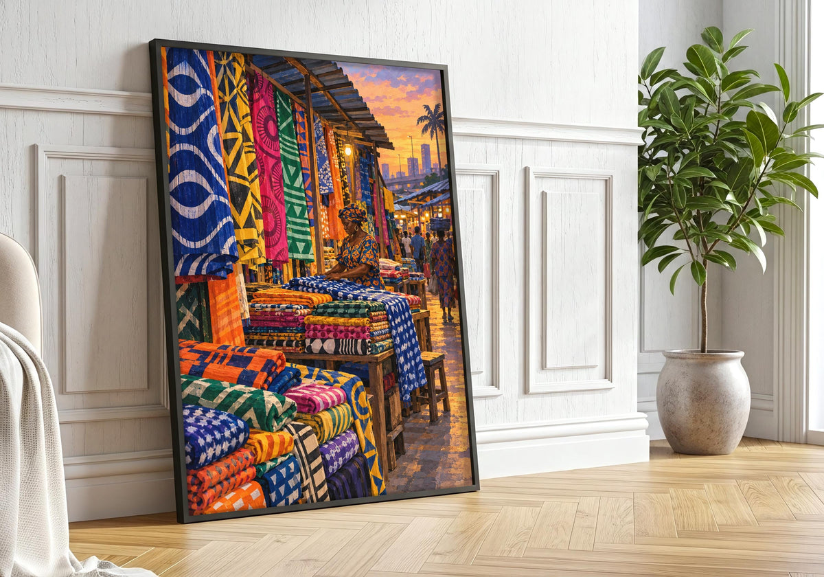 A closer black frame greenery view centres the framed cultural wall art featuring lagos fabric stall at closing time.