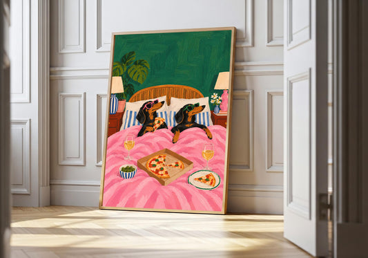 A light wood hero frame presents dachshunds cosy pizza night as dachshund wall art in a clean interior.